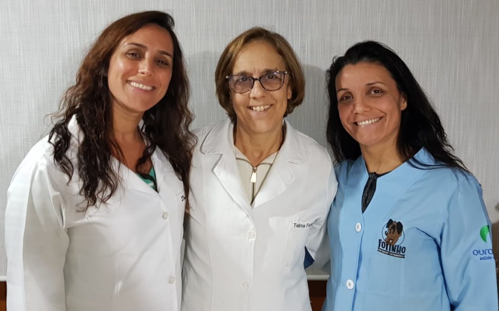 Fundadora Telma Ferrante entre suas filhas Tatiana e Patricia